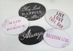 A selection of oval wedding day photo booth props