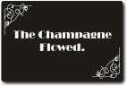The Champagne flowed photo booth prop and sillent movie board