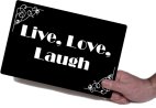 Holding Live Love Laugh movie board photo booth prop
