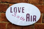 Love is in the Air photo booth sign for weddings