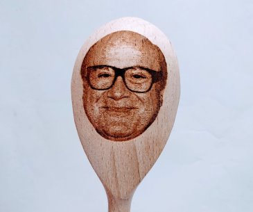 Danny Devito's face on a wooden spoon